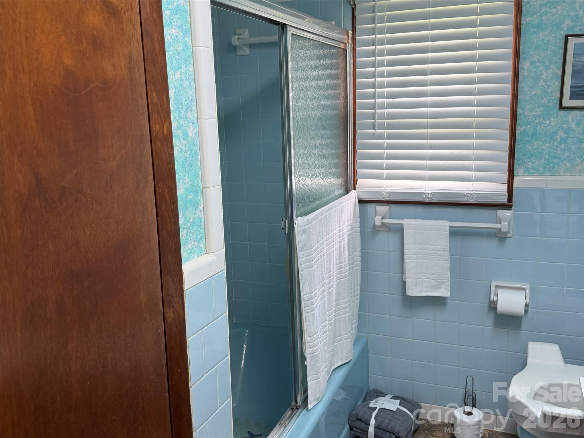 5107 Anderson Mountain Road Maiden, NC 28650 - Photo 13 of 27 a bathroom with a sink and a mirror