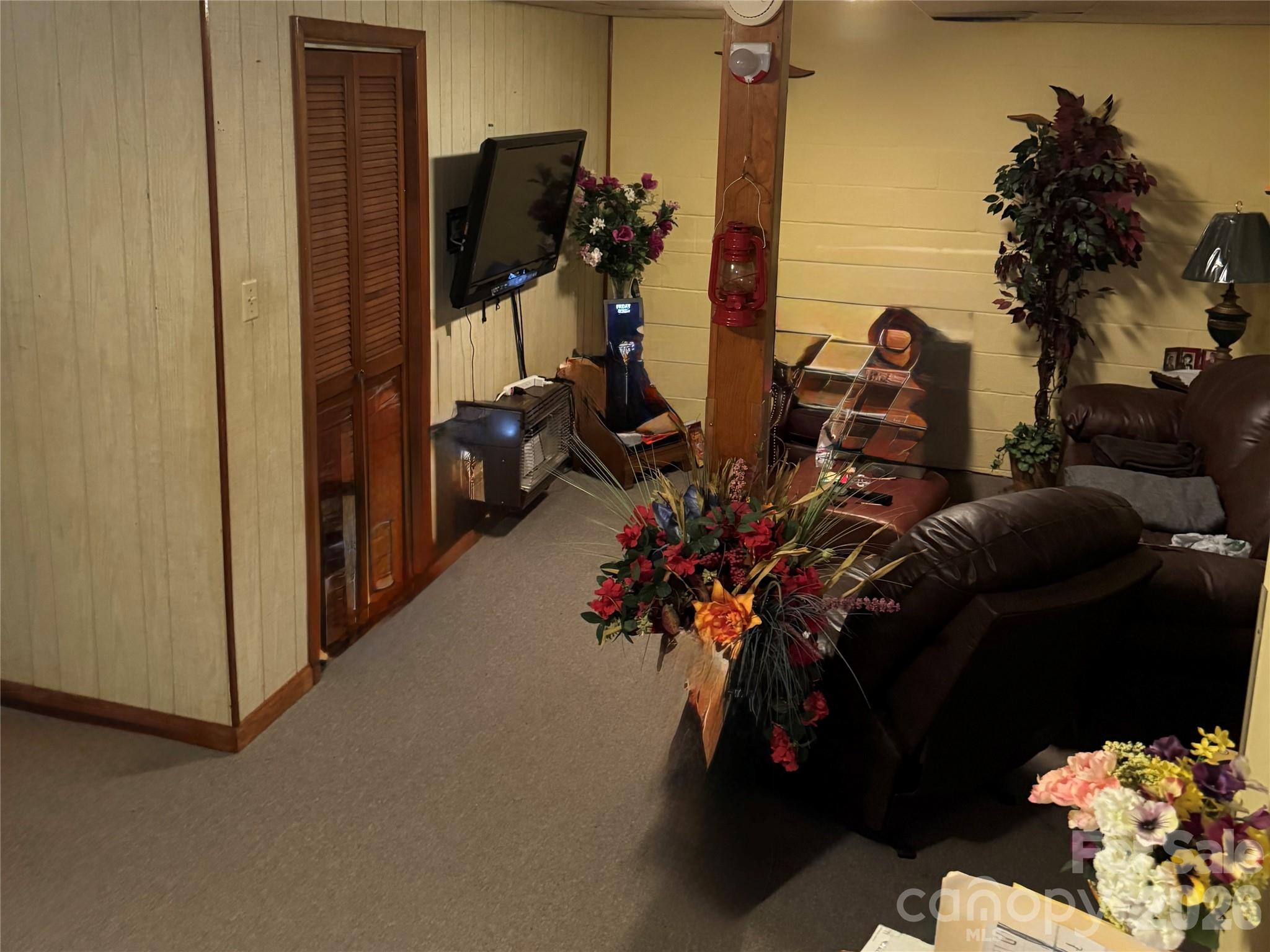 5107 Anderson Mountain Road Maiden, NC 28650 - Photo 18 of 27 a view of a entryway with flower pots