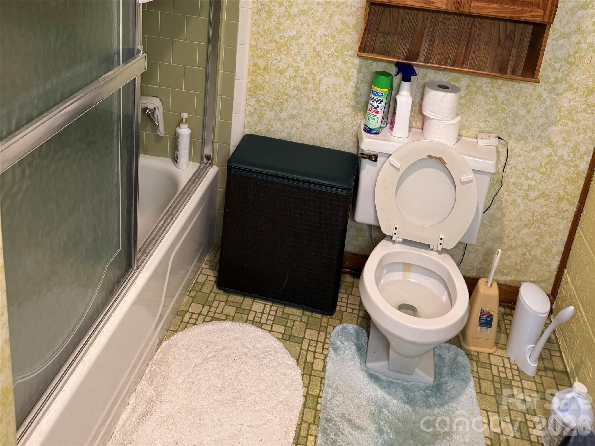 5107 Anderson Mountain Road Maiden, NC 28650 - Photo 21 of 27 a bathroom with a toilet and a sink