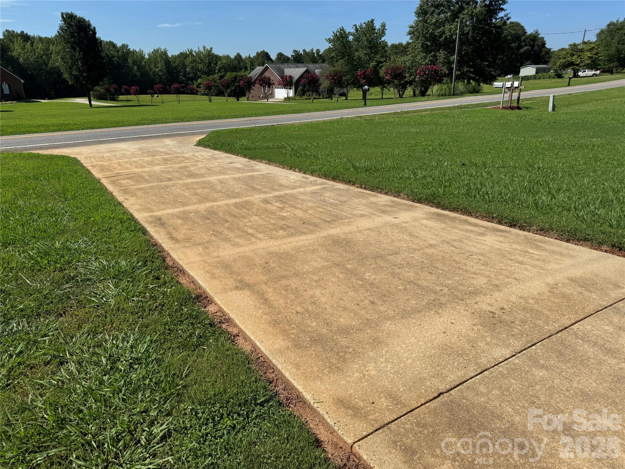 5107 Anderson Mountain Road Maiden, NC 28650 - Photo 26 of 27 a view of field with tall trees