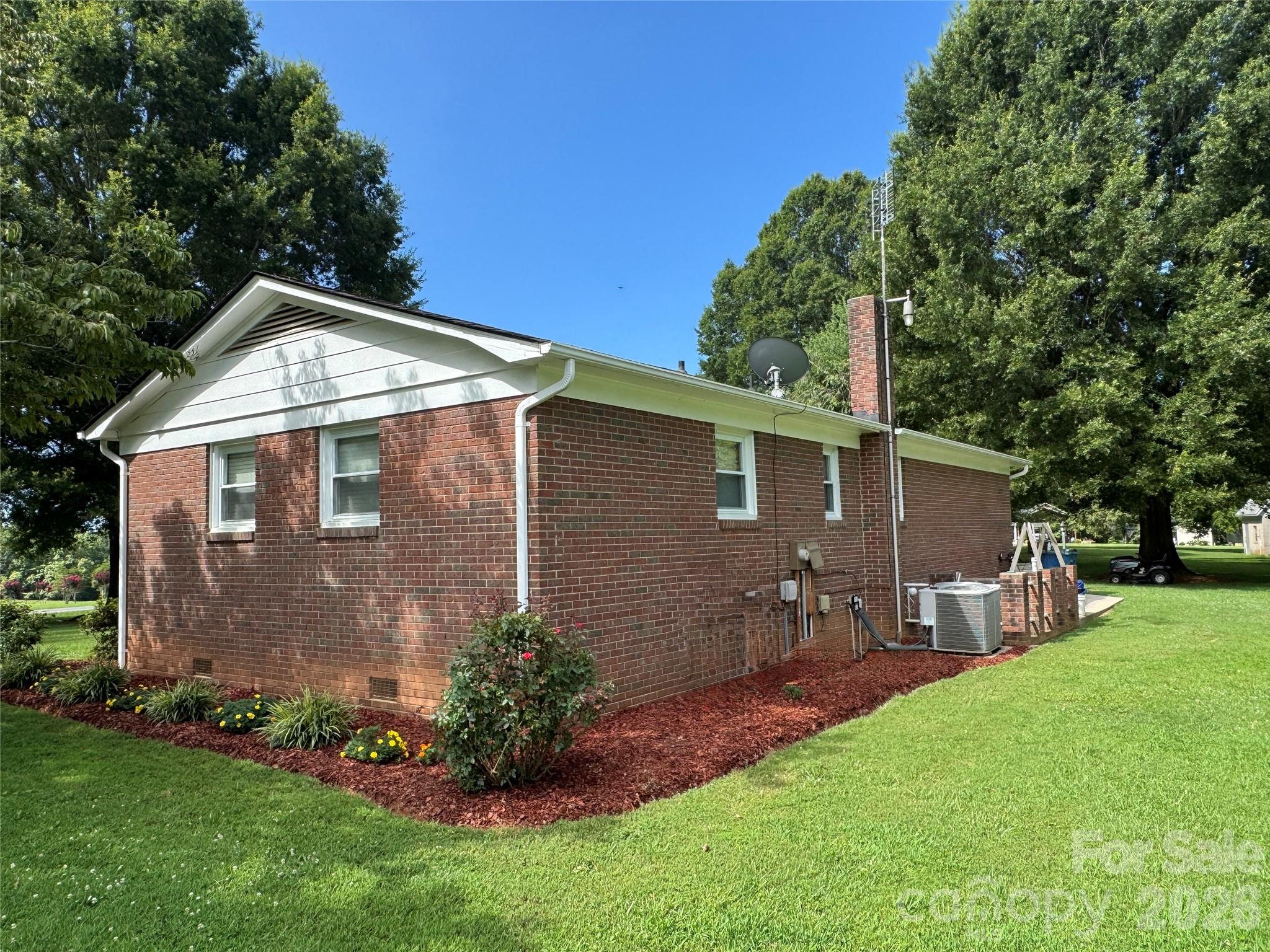 5107 Anderson Mountain Road Maiden, NC 28650 - Photo 5 of 27 a view of a house with a yard