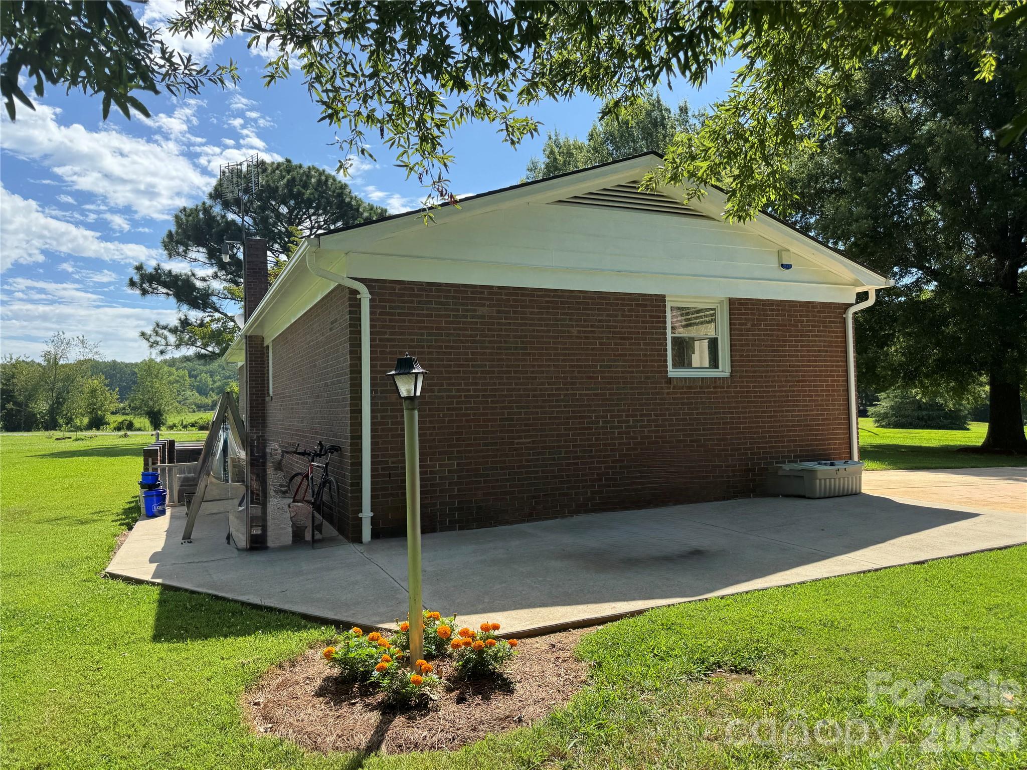 5107 Anderson Mountain Road Maiden, NC 28650 - Photo 6 of 27 a view of a house with a yard