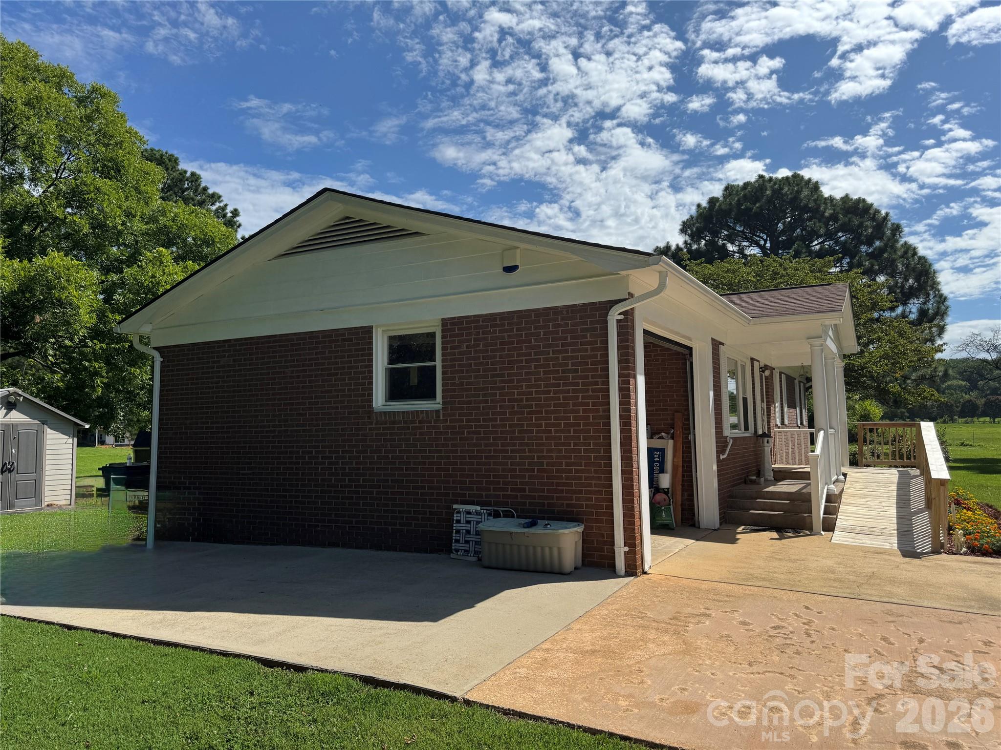 5107 Anderson Mountain Road Maiden, NC 28650 - Photo 8 of 27 a front view of a house with a yard