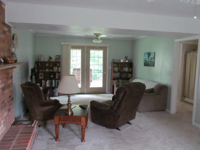 138 Timberline Drive Blue Ridge, VA 24064 - Photo 12 of 32 a living room with furniture and wooden floor