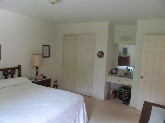 138 Timberline Drive Blue Ridge, VA 24064 - Photo 26 of 32 a bedroom with a bed and a tv on the dresser