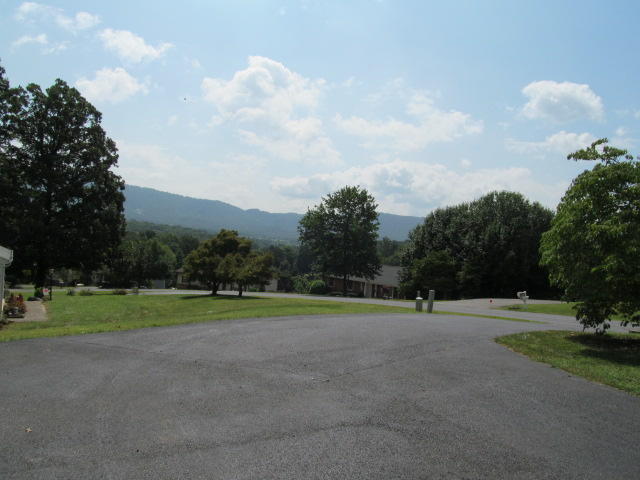 138 Timberline Drive Blue Ridge, VA 24064 - Photo 5 of 32 a view of grassy field with trees