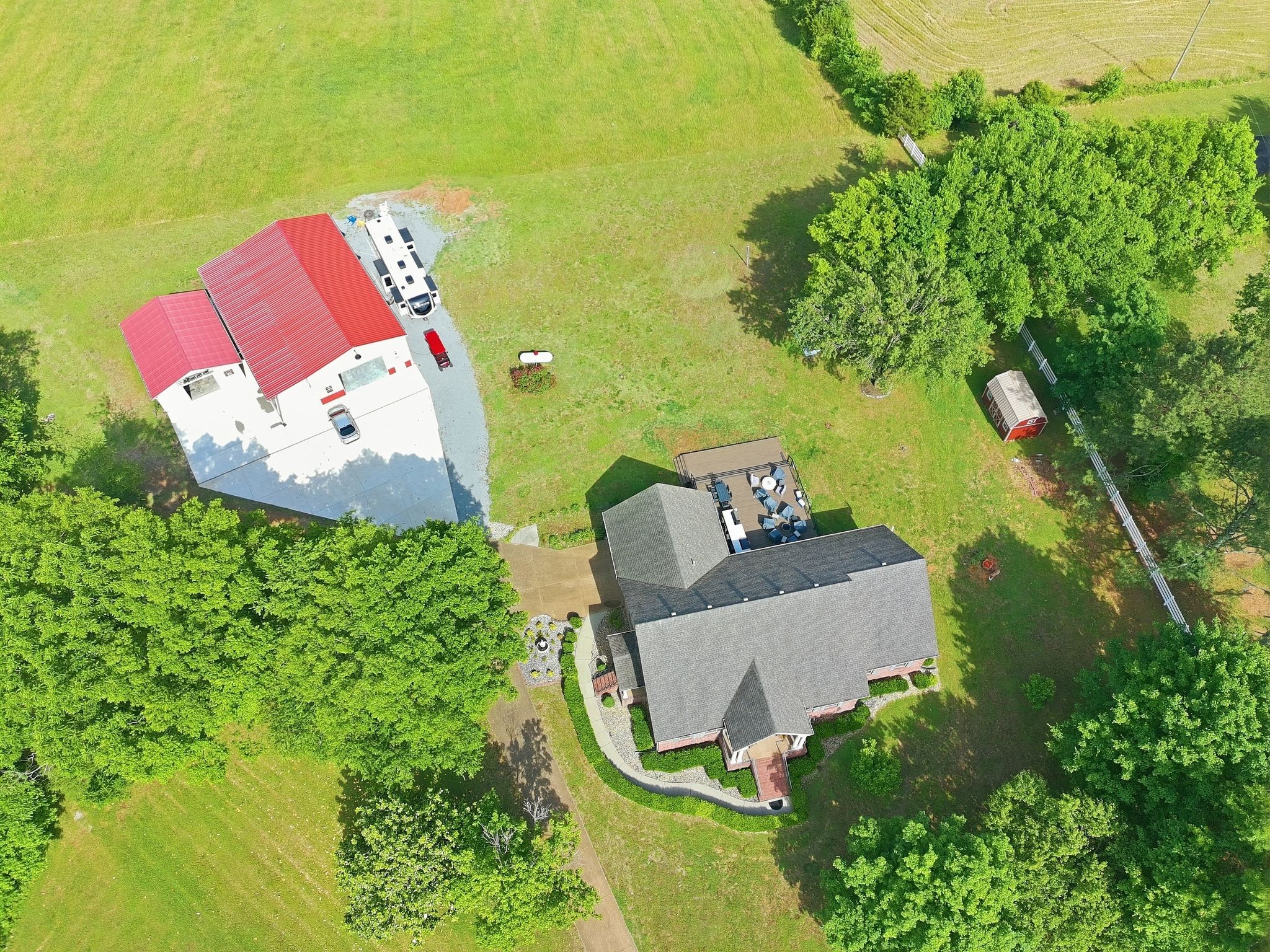 1150 Cochran Cemetery Road Lewisburg, TN 37091 - Photo 52 of 63 an aerial view of a house with swimming pool and outdoor seating