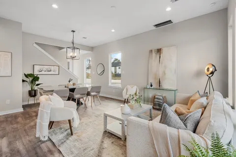 a bedroom with a bed and a lamp