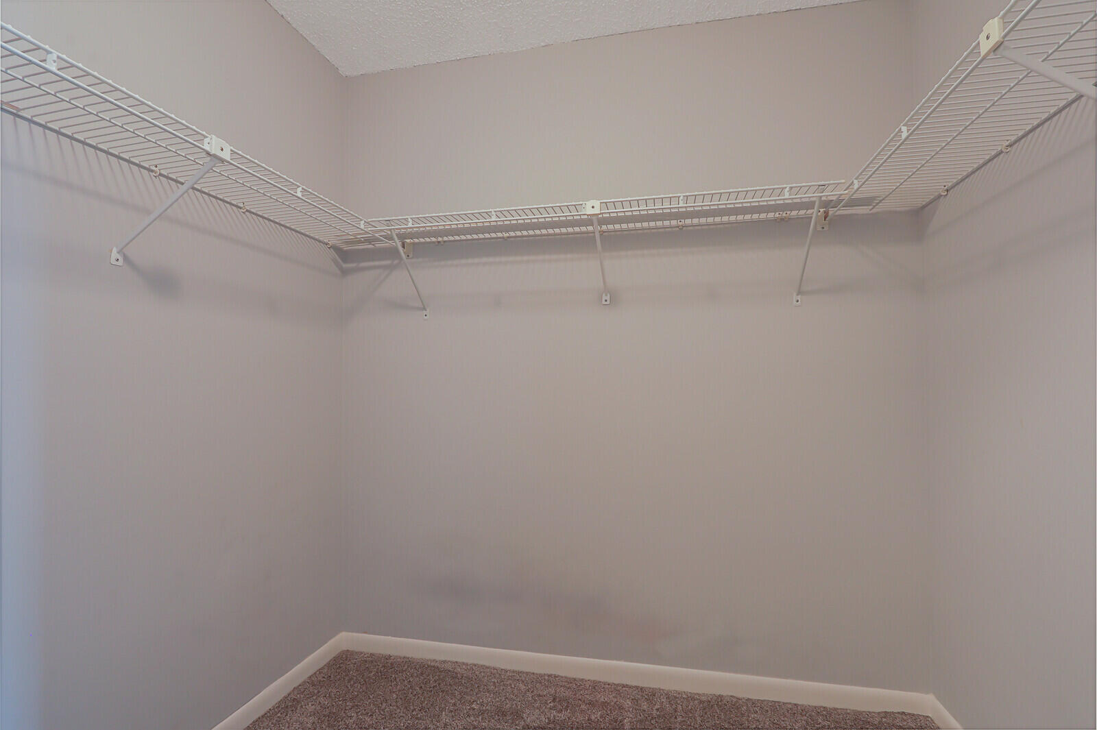 1102 Wingfoot Drive, Unit D Jupiter, FL 33458 - Photo 21 of 30 a view of a room with shelf on the wall
