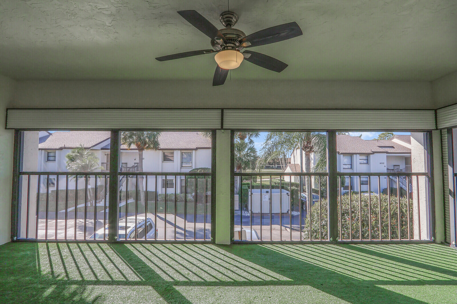1102 Wingfoot Drive, Unit D Jupiter, FL 33458 - Photo 28 of 30 a view of a porch with a backyard