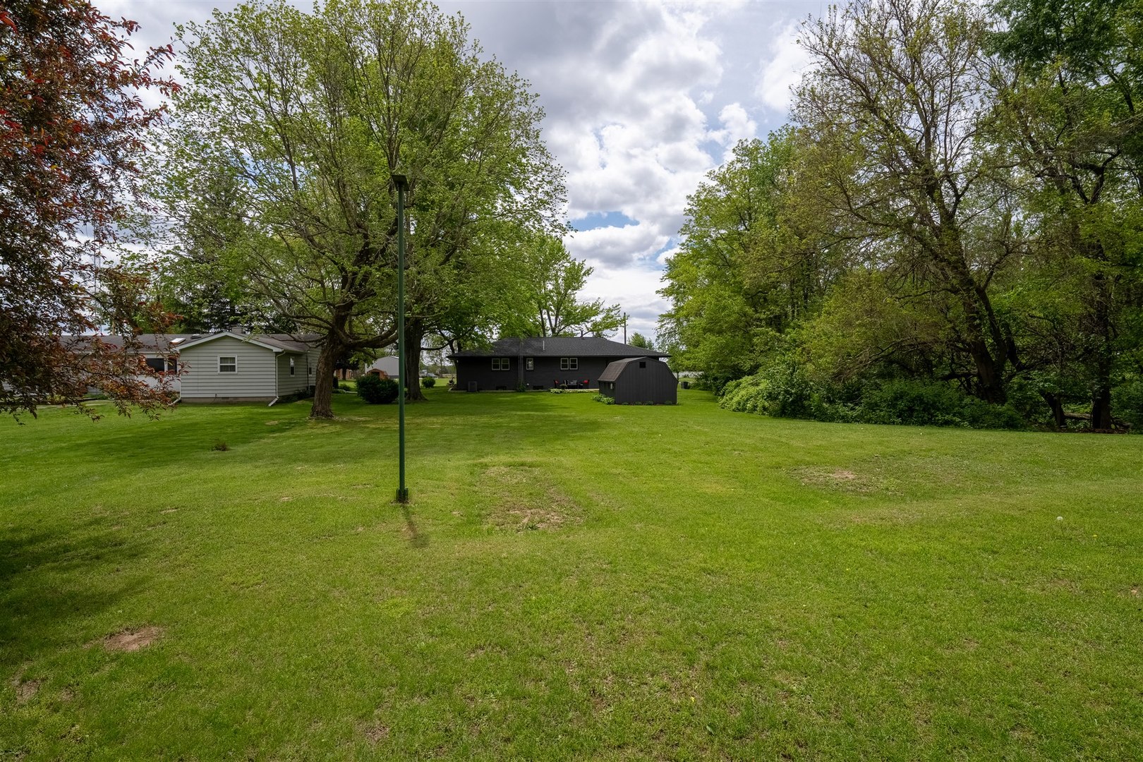 7277 East 3000 N Road Cornell, IL 61319 - Photo 30 of 40 a view of a garden with a slide