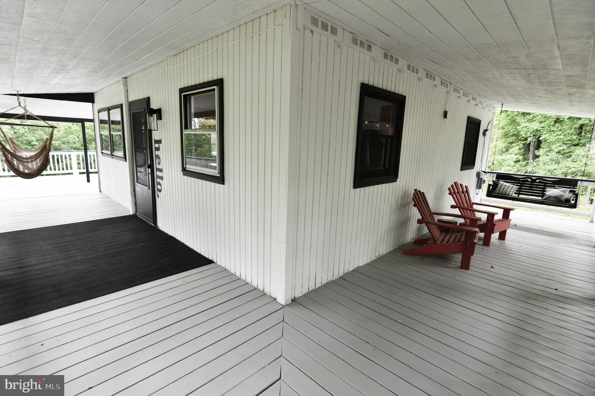 513 Cardinal Drive Rio, WV 26755 - Photo 49 of 55 Side and front decks