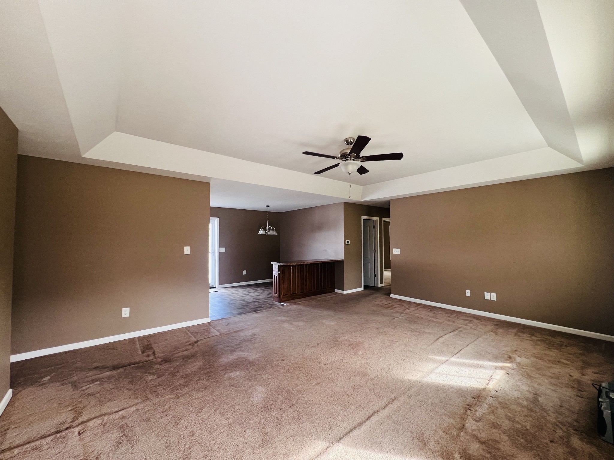8659 Dog Branch Road Mount Pleasant, TN 38474 - Photo 12 of 36 a view of a livingroom with a ceiling fan and window