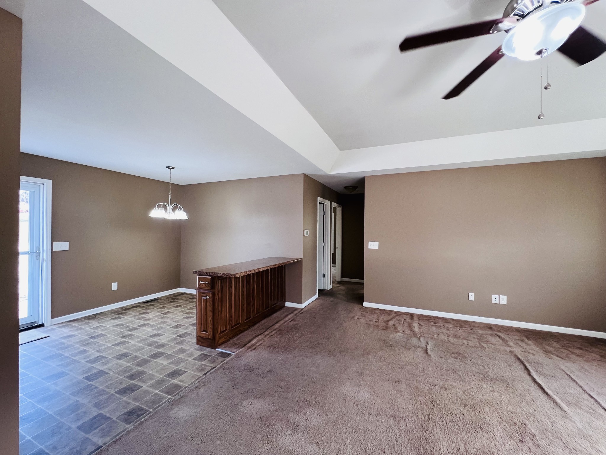 8659 Dog Branch Road Mount Pleasant, TN 38474 - Photo 15 of 36 a view of an empty room with window and chandelier fan