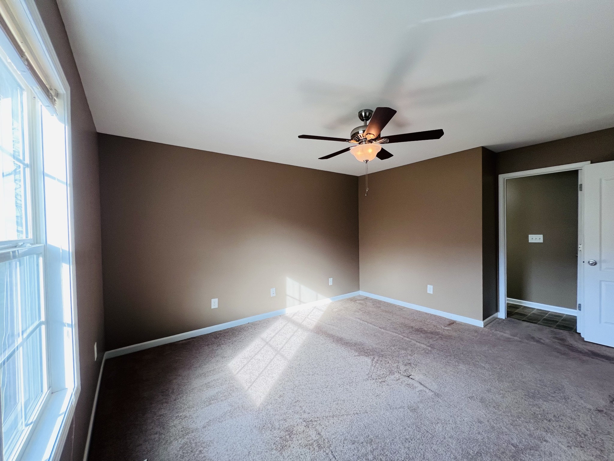 8659 Dog Branch Road Mount Pleasant, TN 38474 - Photo 23 of 36 wooden floor in an empty room with a window