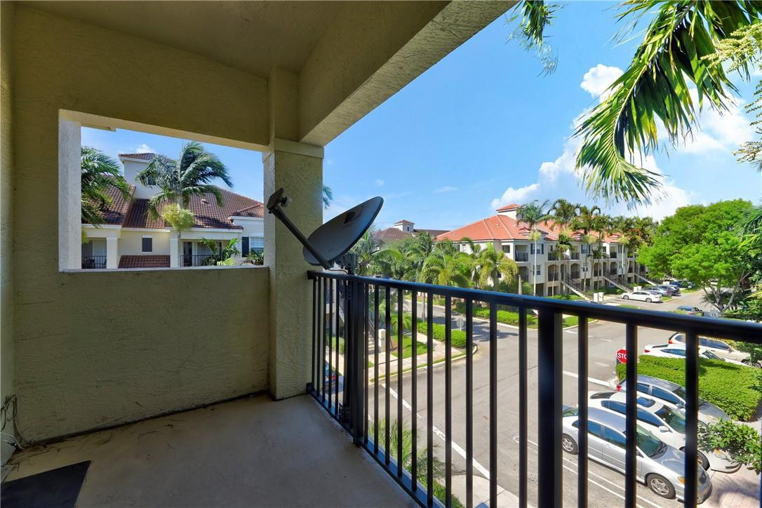 5840 West Sample Road, Unit 308 Coral Springs, FL 33067 - Photo 25 of 54 a view of a balcony
