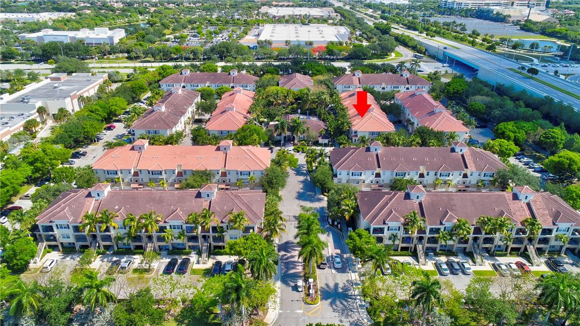 5840 West Sample Road, Unit 308 Coral Springs, FL 33067 - Photo 42 of 54 a view of a city
