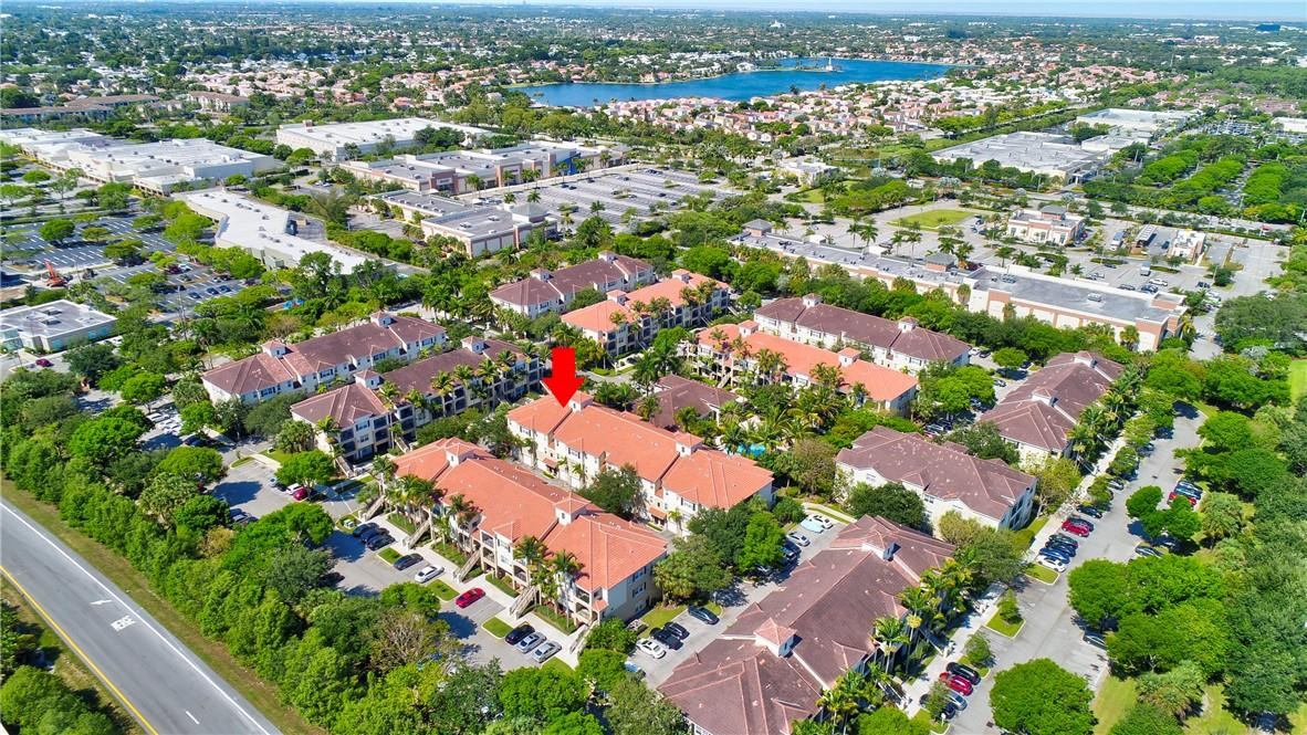 5840 West Sample Road, Unit 308 Coral Springs, FL 33067 - Photo 47 of 54 an aerial view of residential houses with outdoor space