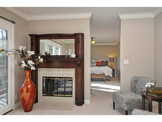 16100 Viewfield Road Monte Sereno, CA 95030 - Photo 13 of 25 a living room with furniture and a fireplace