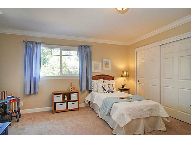 16100 Viewfield Road Monte Sereno, CA 95030 - Photo 16 of 25 a bedroom with a bed and a window