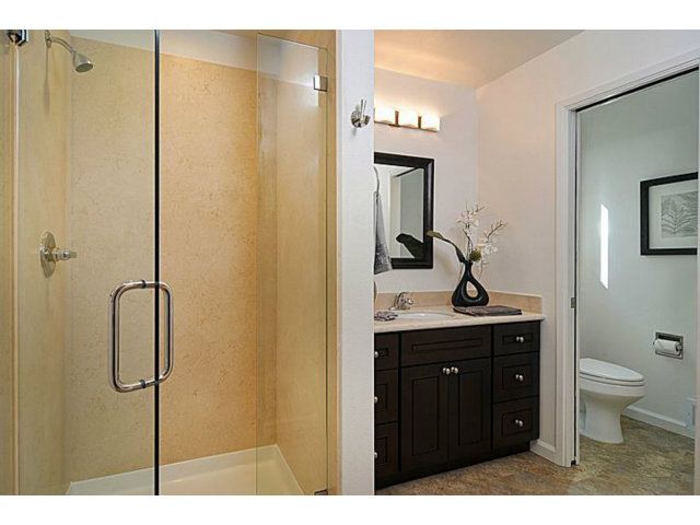 16100 Viewfield Road Monte Sereno, CA 95030 - Photo 20 of 25 a bathroom with a granite countertop sink toilet and shower