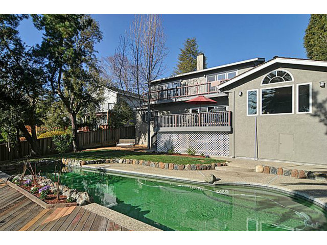 16100 Viewfield Road Monte Sereno, CA 95030 - Photo 24 of 25 a view of a house with backyard and sitting area