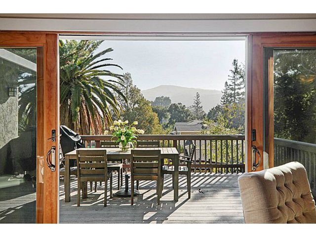 16100 Viewfield Road Monte Sereno, CA 95030 - Photo 8 of 25 a balcony with table and chairs