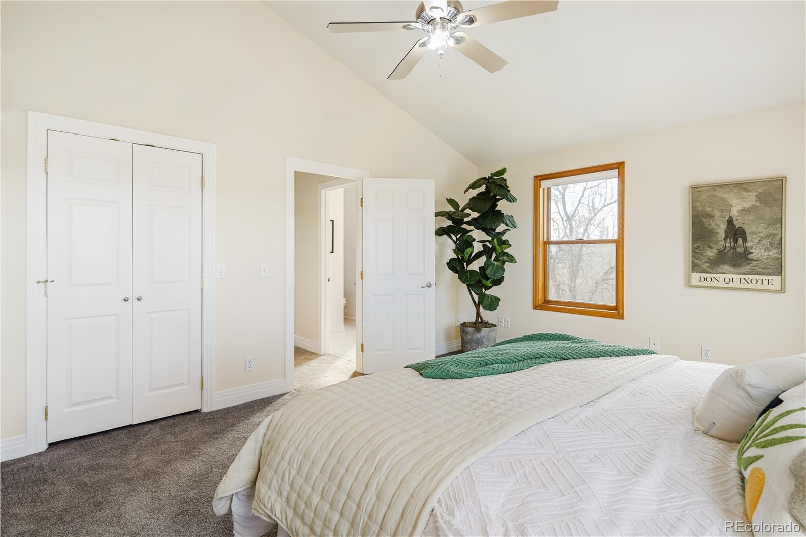 380 County Road Louisville, CO 80027 - Photo 26 of 42 a bedroom with a bed and a window