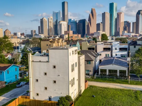 a view of a city with tall buildings