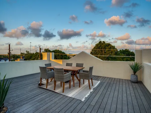 a view of a terrace with seating area