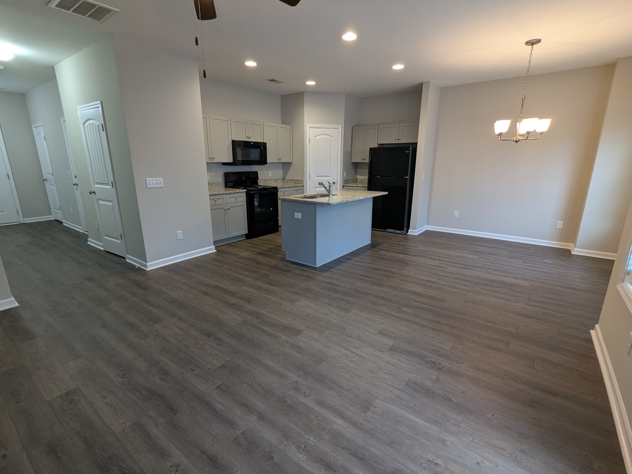 710 Pippin Drive Antioch, TN 37013 - Photo 4 of 16 a view of a kitchen with refrigerator and wooden floor
