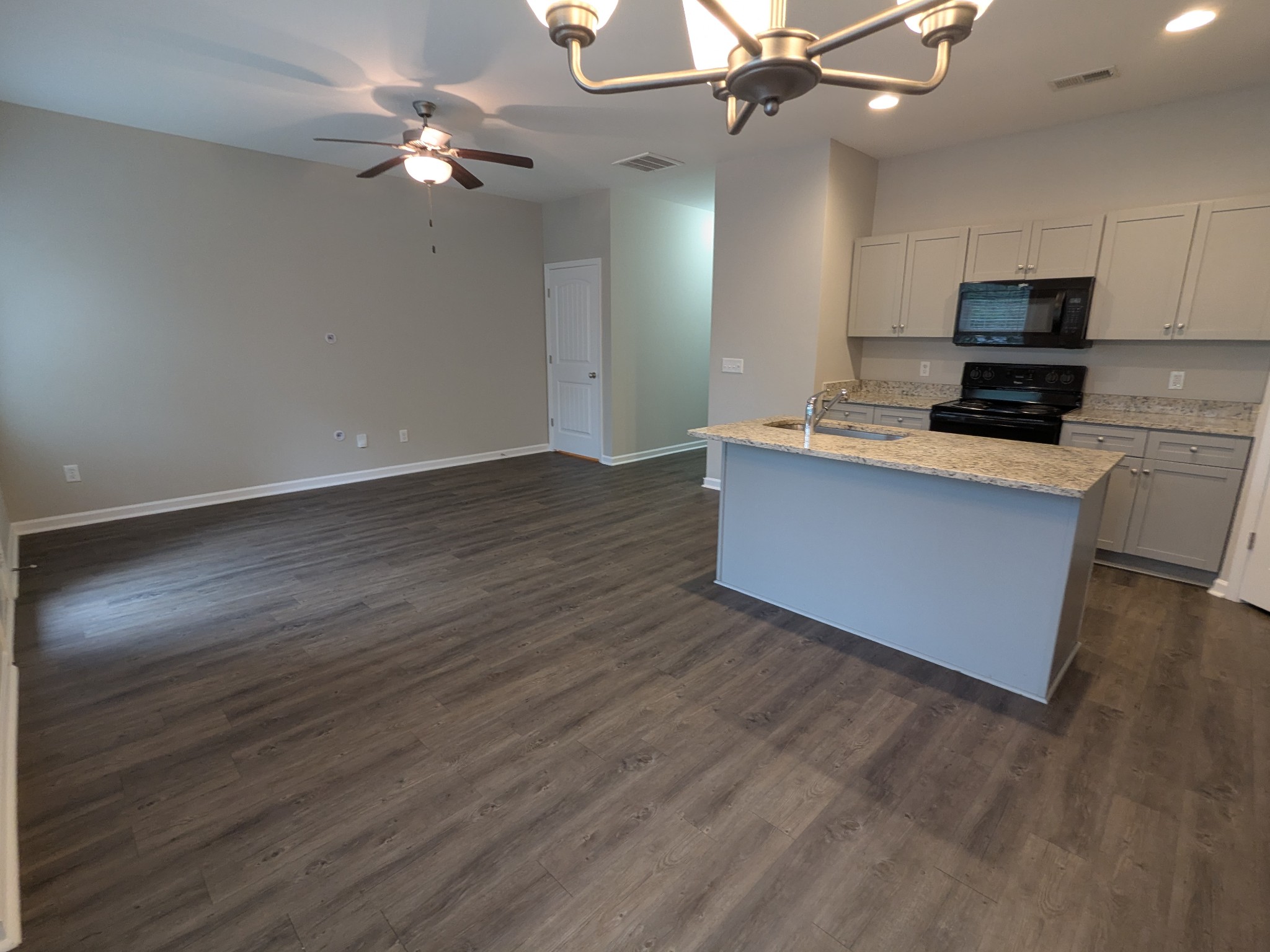 710 Pippin Drive Antioch, TN 37013 - Photo 6 of 16 a view of kitchen with sink microwave and stove