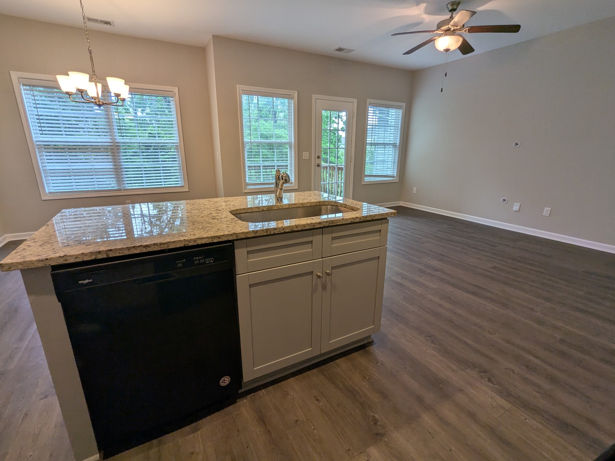 710 Pippin Drive Antioch, TN 37013 - Photo 8 of 16 a kitchen with granite countertop a sink and a stove