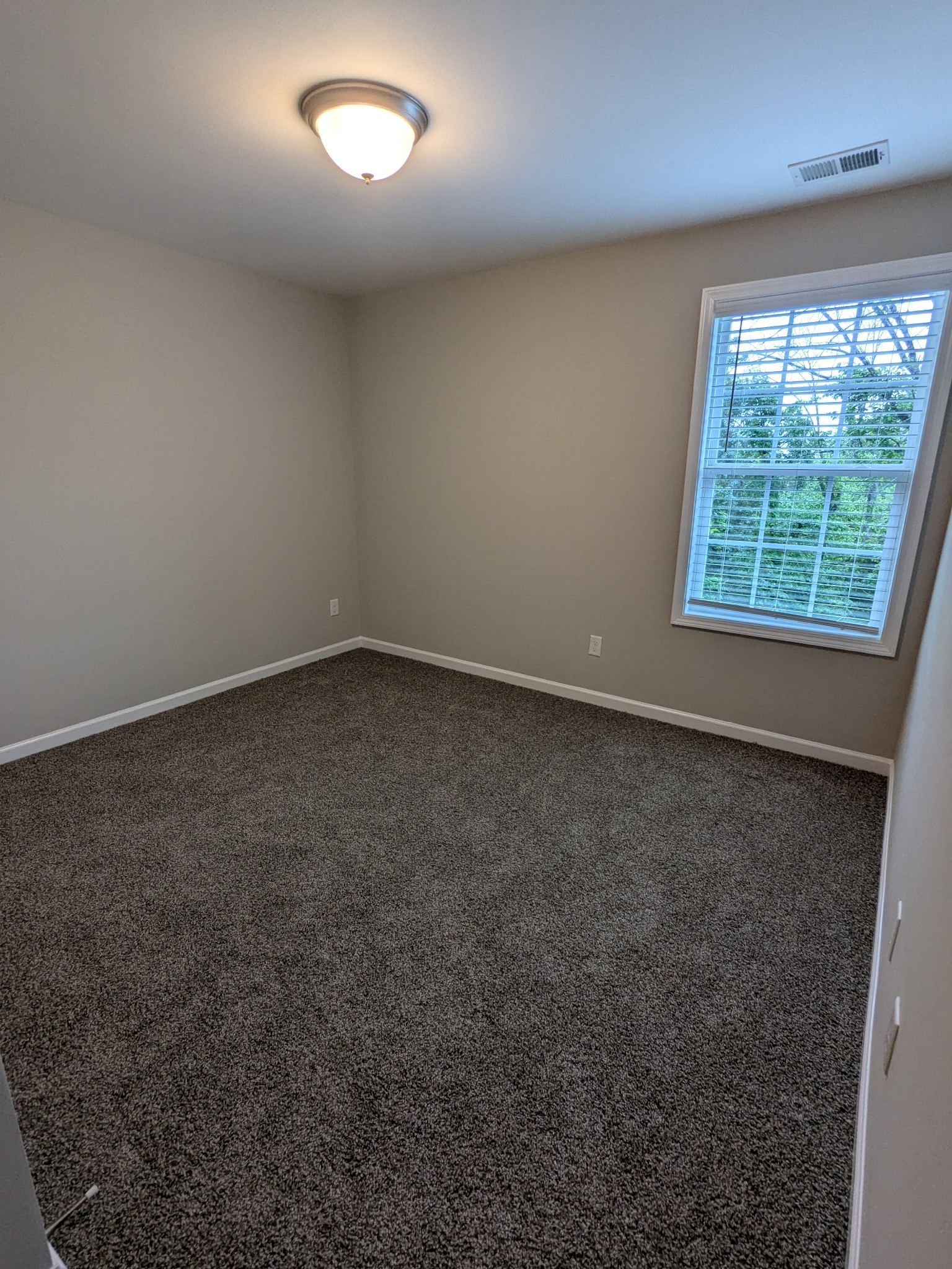 710 Pippin Drive Antioch, TN 37013 - Photo 10 of 16 an empty room with a window