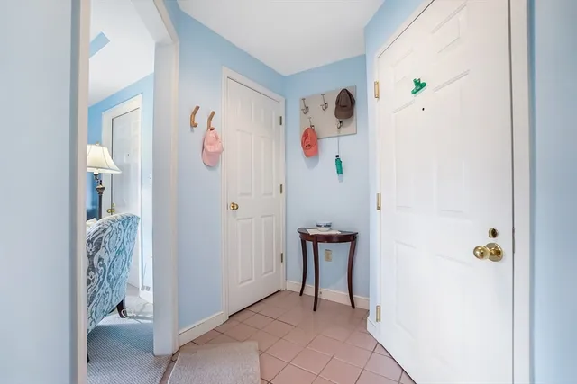 a view of an entryway with bathroom