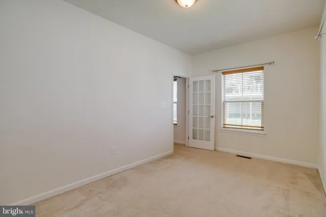 a view of small space with wooden floor