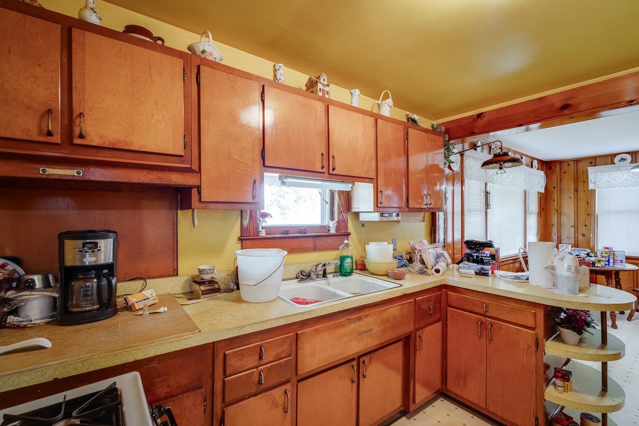 7049 Cross Keys Road Mount Crawford, VA 22841 - Photo 13 of 49 a kitchen with stainless steel appliances a sink stove and cabinets