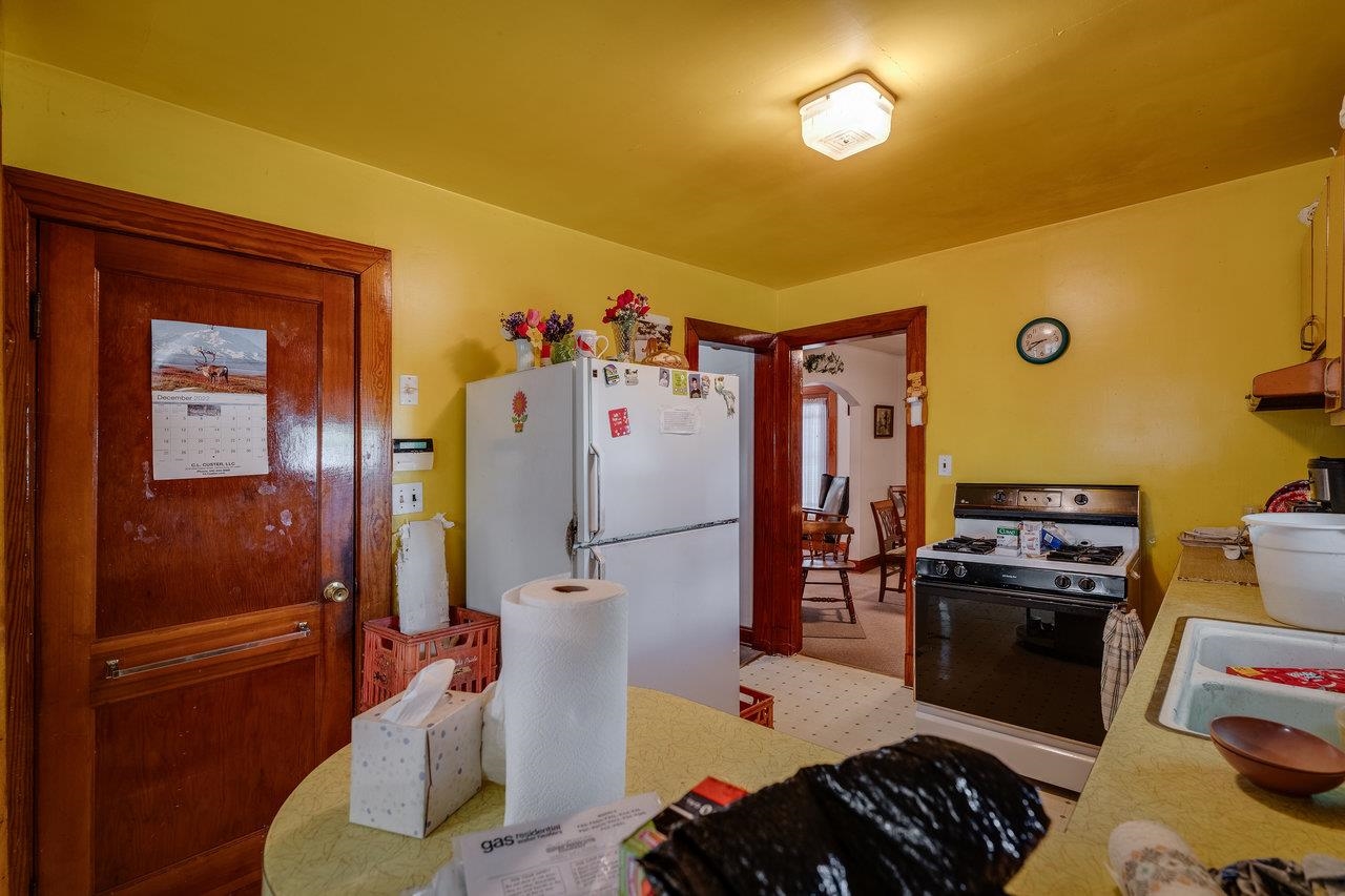 7049 Cross Keys Road Mount Crawford, VA 22841 - Photo 15 of 49 a kitchen with stainless steel appliances granite countertop a refrigerator and a stove