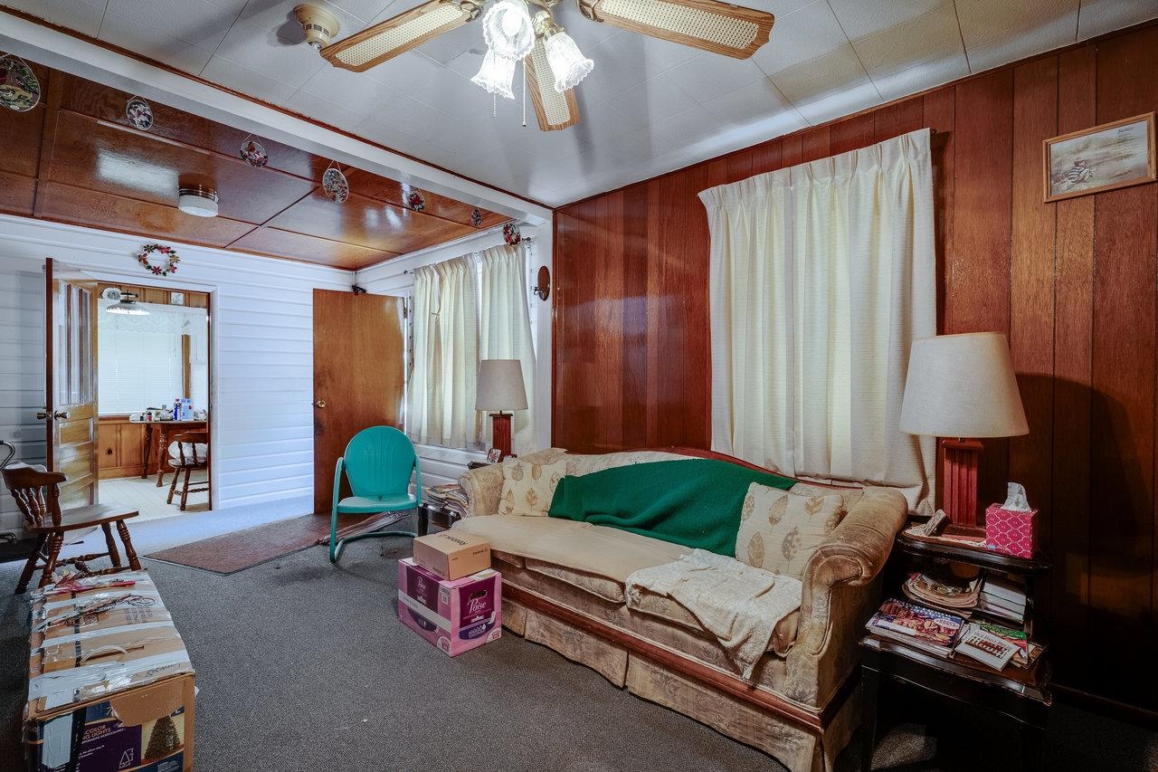 7049 Cross Keys Road Mount Crawford, VA 22841 - Photo 21 of 49 a living room with furniture and a chandelier
