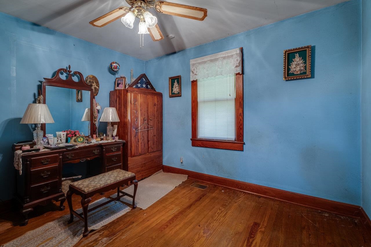 7049 Cross Keys Road Mount Crawford, VA 22841 - Photo 25 of 49 a bed room with furniture and a window