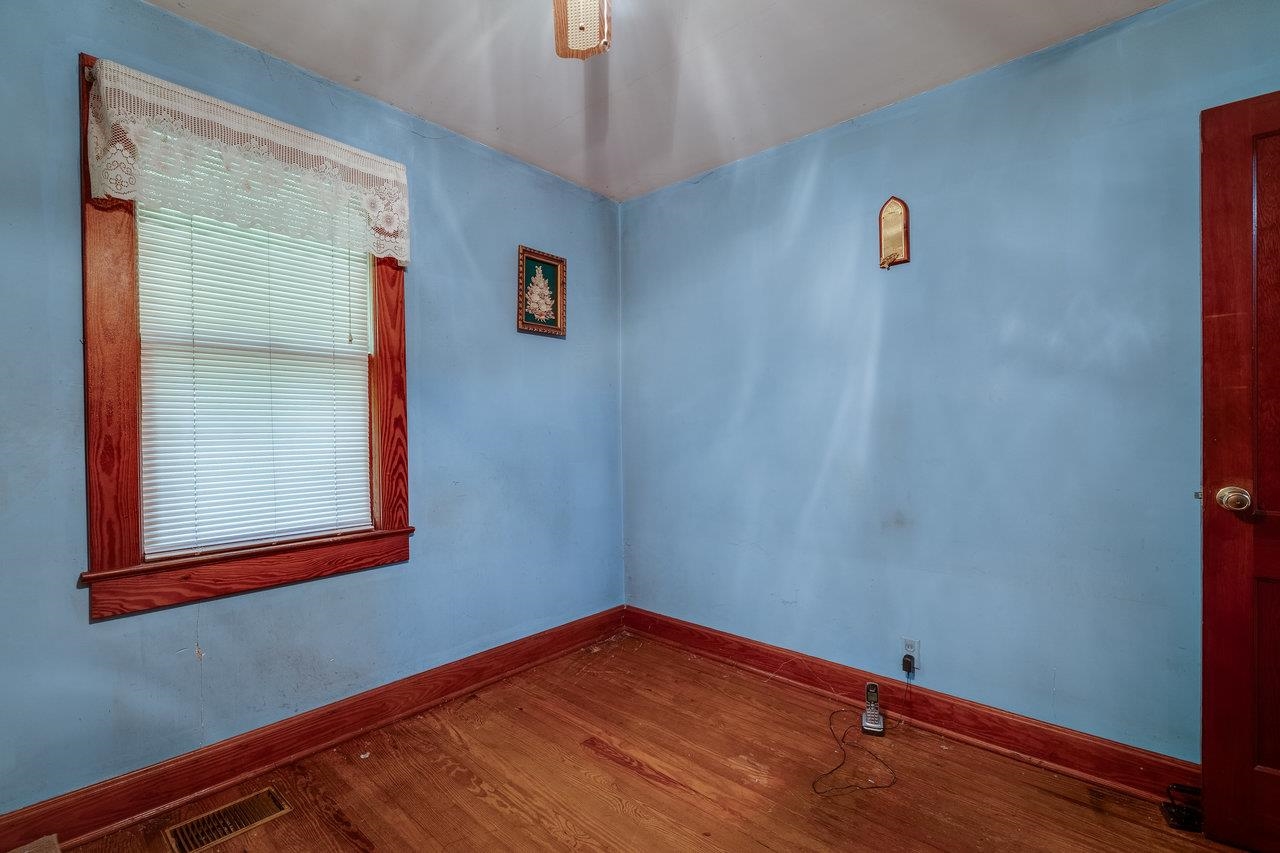 7049 Cross Keys Road Mount Crawford, VA 22841 - Photo 27 of 49 a view of a small space with wooden floor and a window