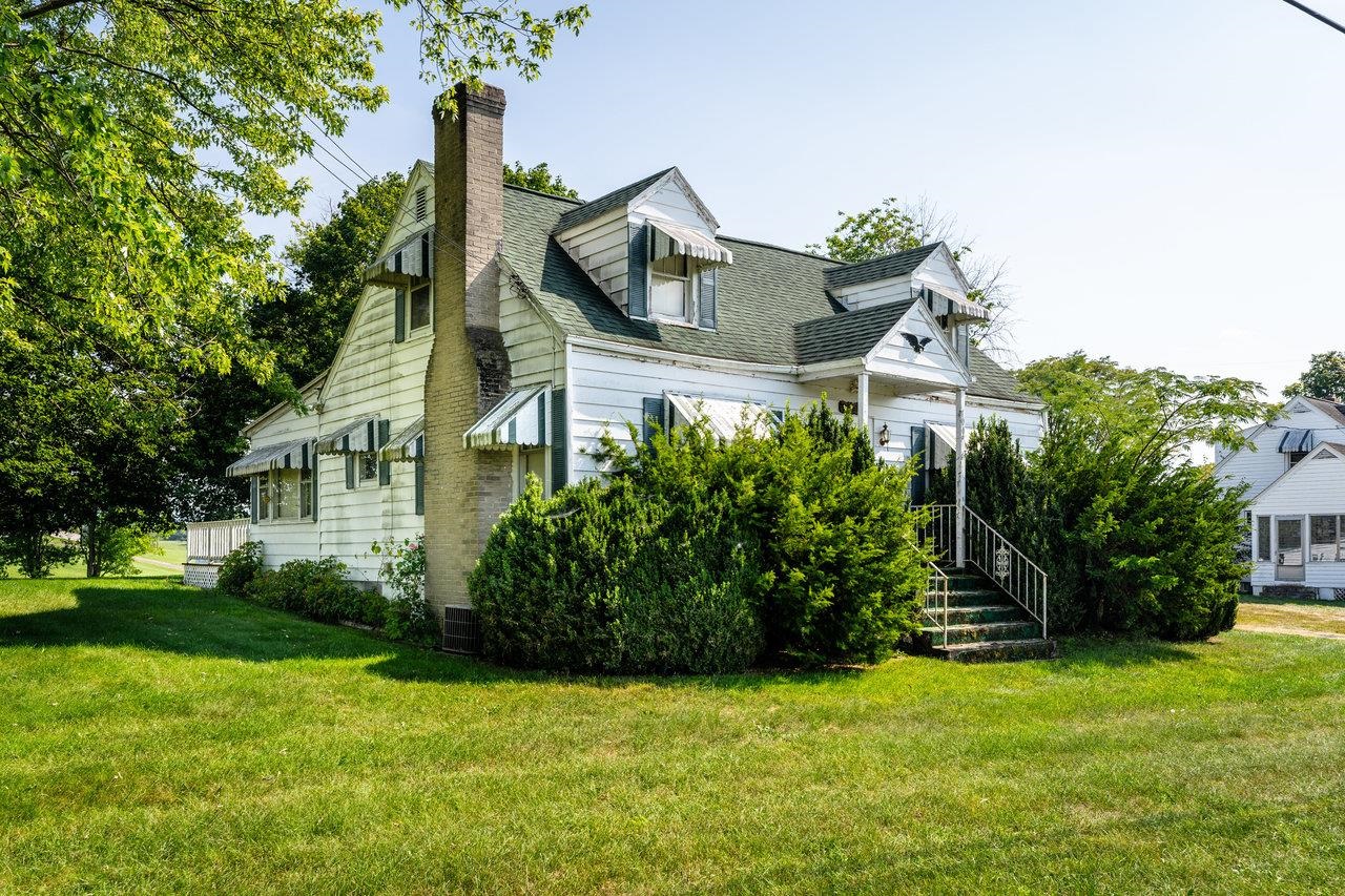 7049 Cross Keys Road Mount Crawford, VA 22841 - Photo 3 of 49 a front view of a house with a garden