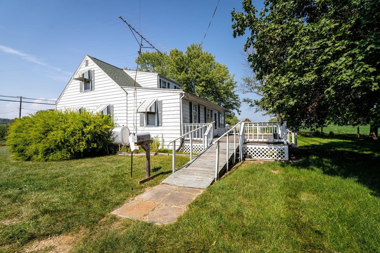 7049 Cross Keys Road Mount Crawford, VA 22841 - Photo 40 of 49 a view of house with a yard and potted plants