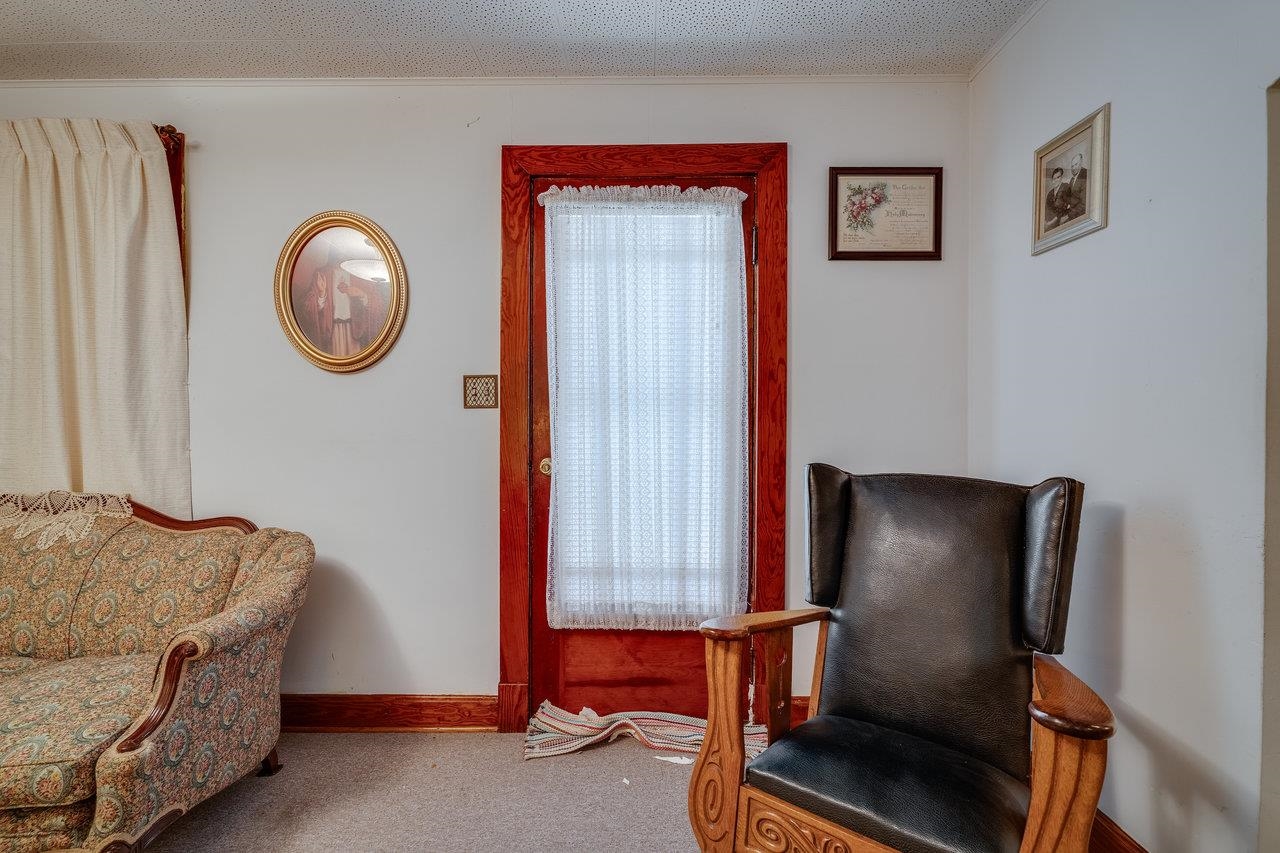 7049 Cross Keys Road Mount Crawford, VA 22841 - Photo 5 of 49 a bedroom with a bed and a lamp on dresser