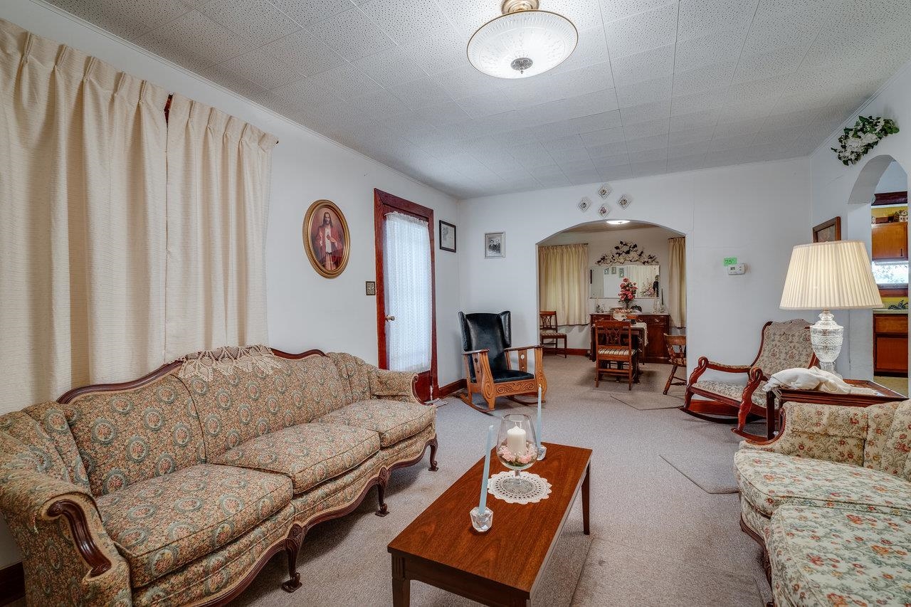 7049 Cross Keys Road Mount Crawford, VA 22841 - Photo 8 of 49 a living room with furniture and a fireplace