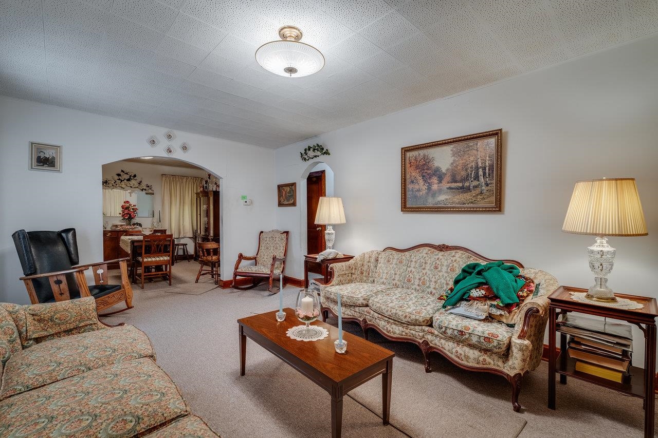 7049 Cross Keys Road Mount Crawford, VA 22841 - Photo 9 of 49 a living room with furniture and a lamp
