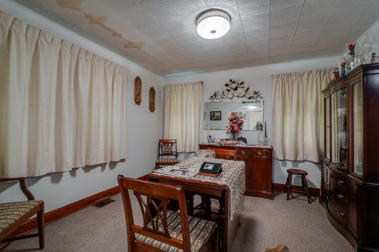 7049 Cross Keys Road Mount Crawford, VA 22841 - Photo 10 of 49 a bed room with furniture and a window