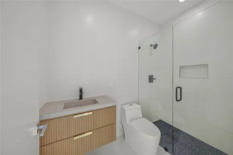 a kitchen with a sink and a large window