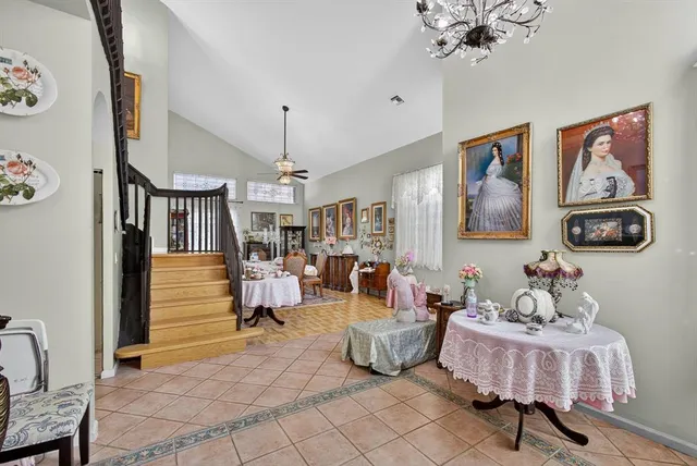 a kitchen with stainless steel appliances granite countertop a stove refrigerator and cabinets
