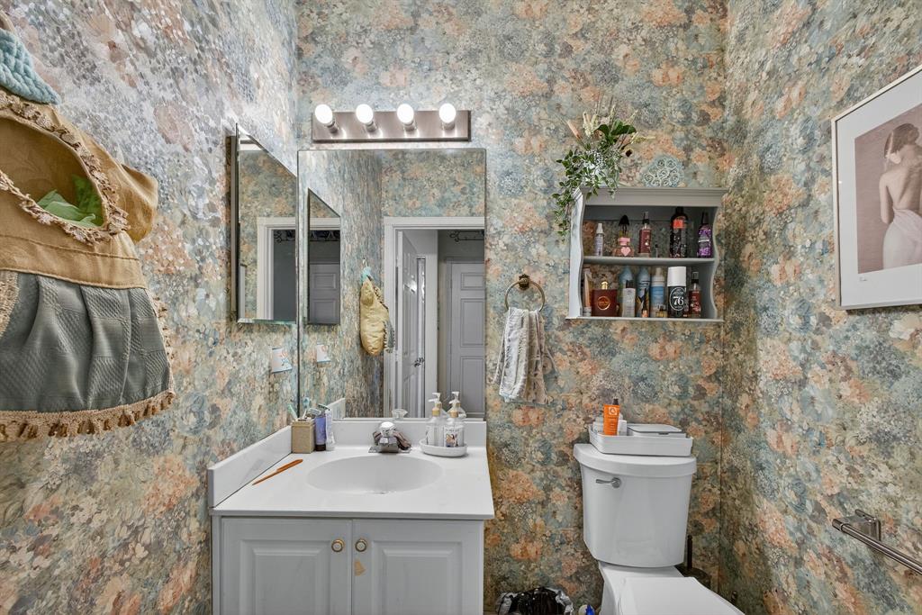 2119 Chagall Circle West Palm Beach, FL 33409 - Photo 13 of 63 a bathroom with a sink toilet and shower